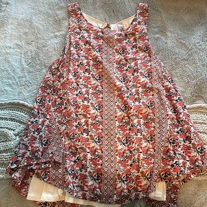 Patterned tank top with white undershirt
